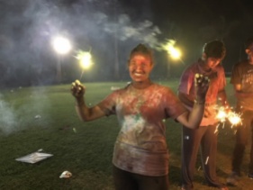 Celebrating Holi and playing with sparklers with my classmates. The festival of color was something that I always wanted to experience. It was amazing that I had the opportunity. Never in my lifetime would I have thought I would be in India to experience this event